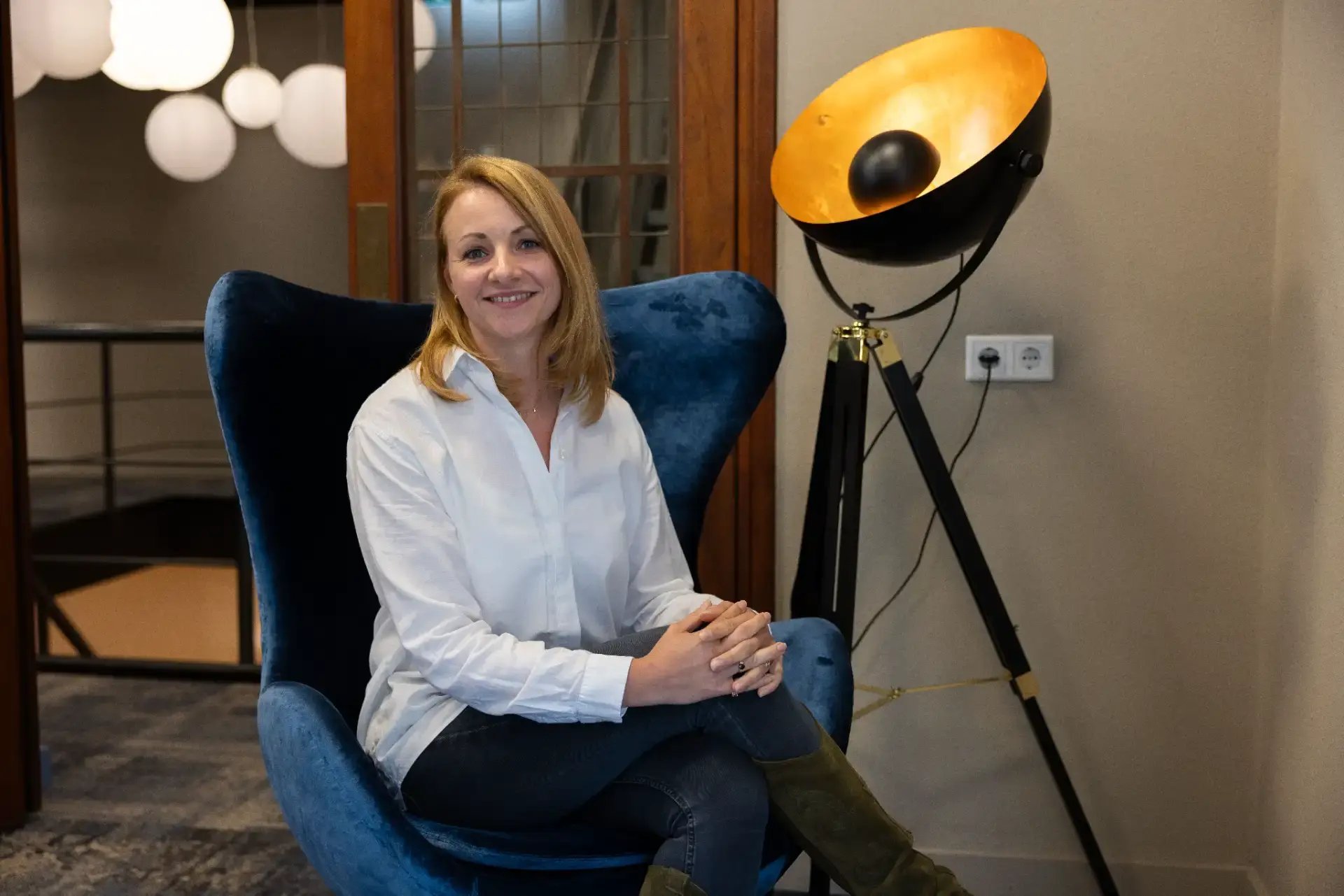 Woman in chair looking into camera