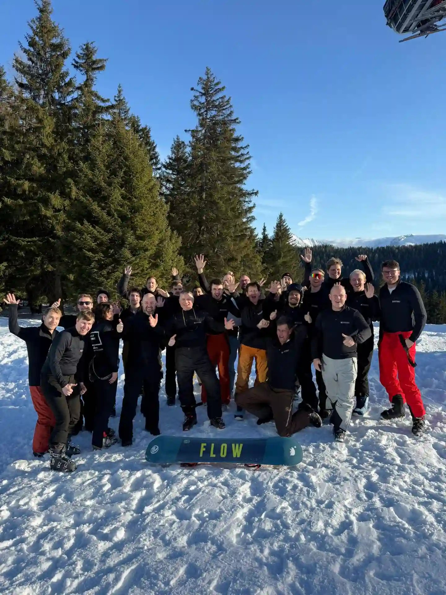 Large group of people in the snow on the slope.
