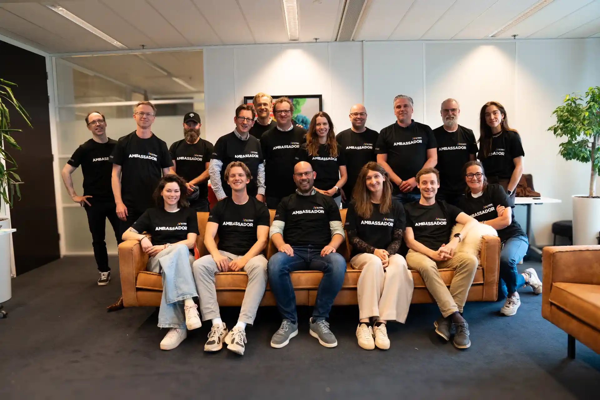 Groen mensen met t-shirt met AI First ambassadeur.